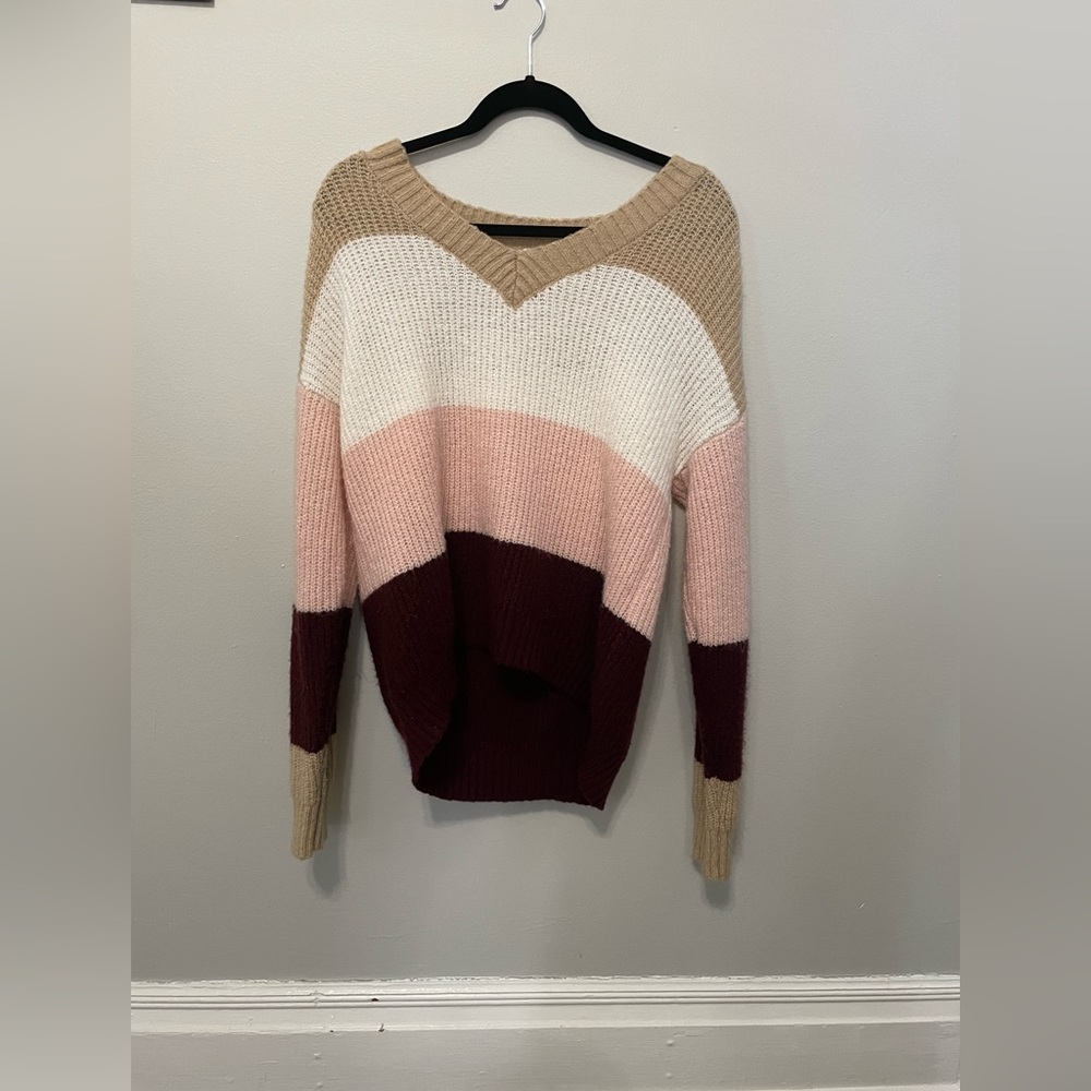 Light weight multi colored sweater. Never worn.